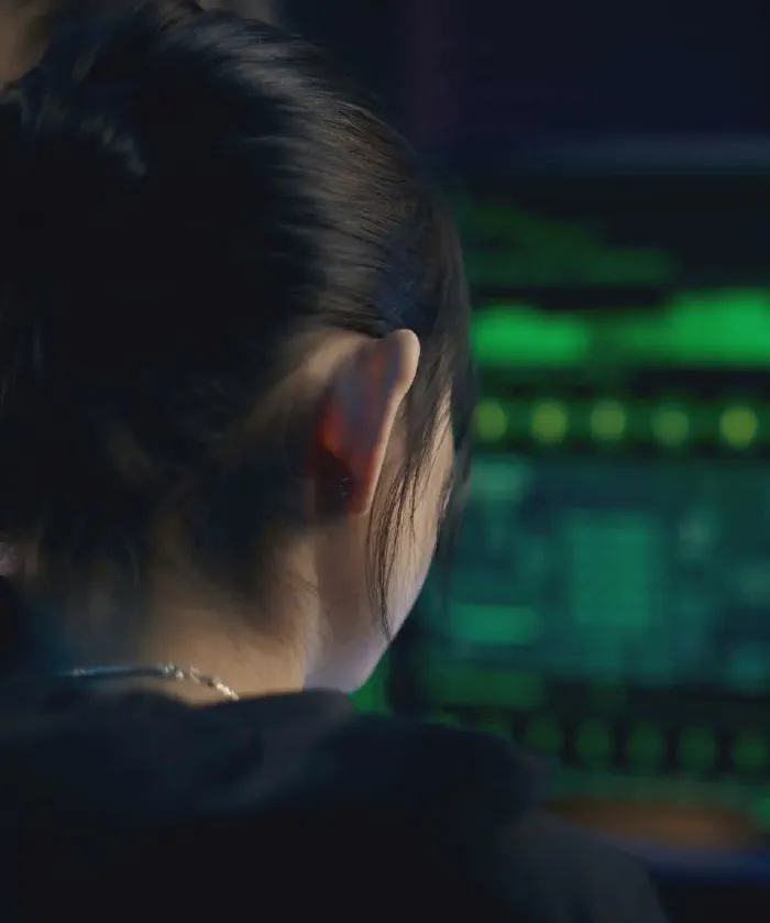 Woman in front of a screen